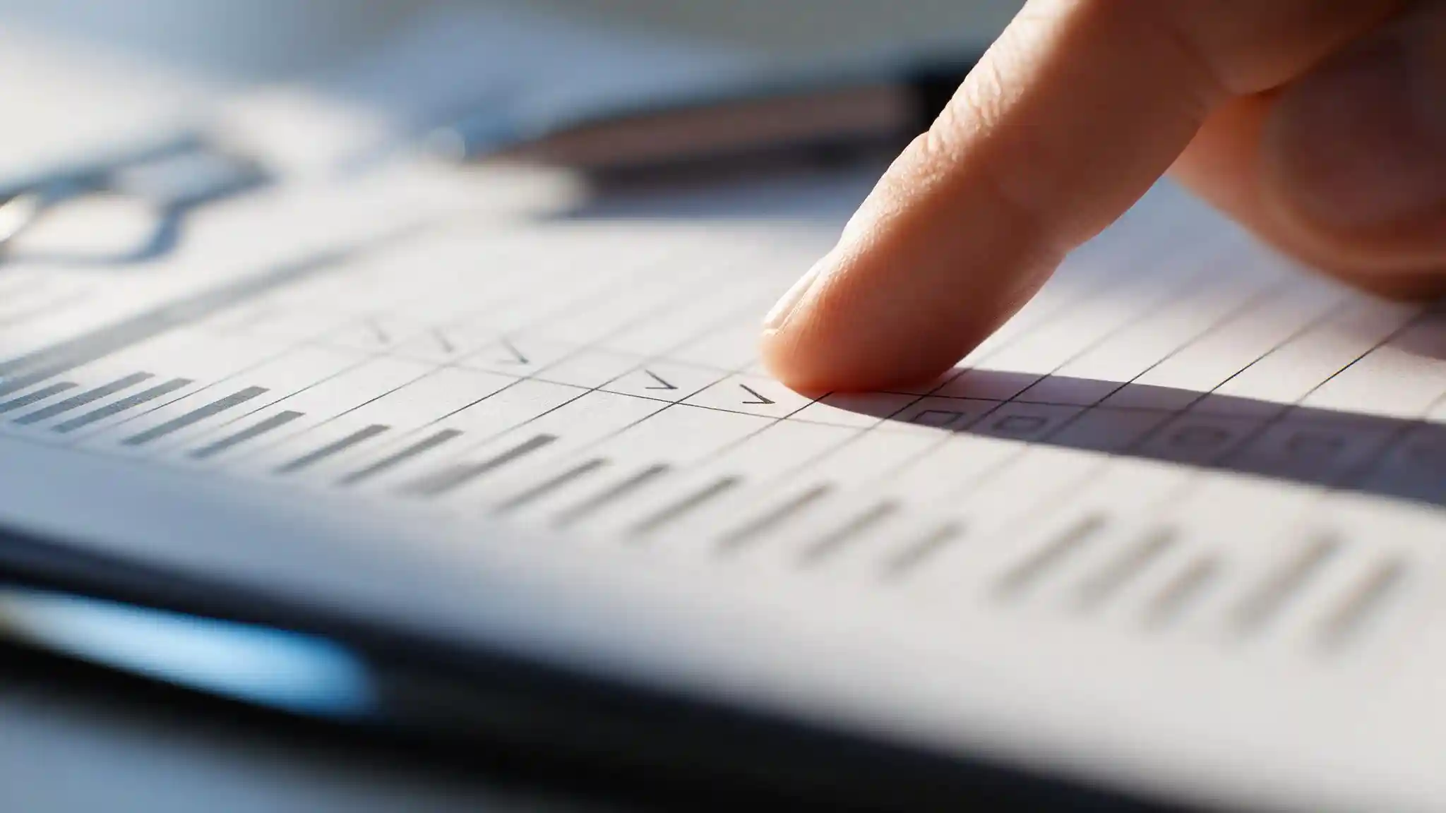 Compliance evidence being checked item by item ahead of a regulatory assessment